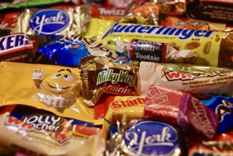 During Halloween millions of Americans consume copious amounts of candy, leading to wasteful habits.  