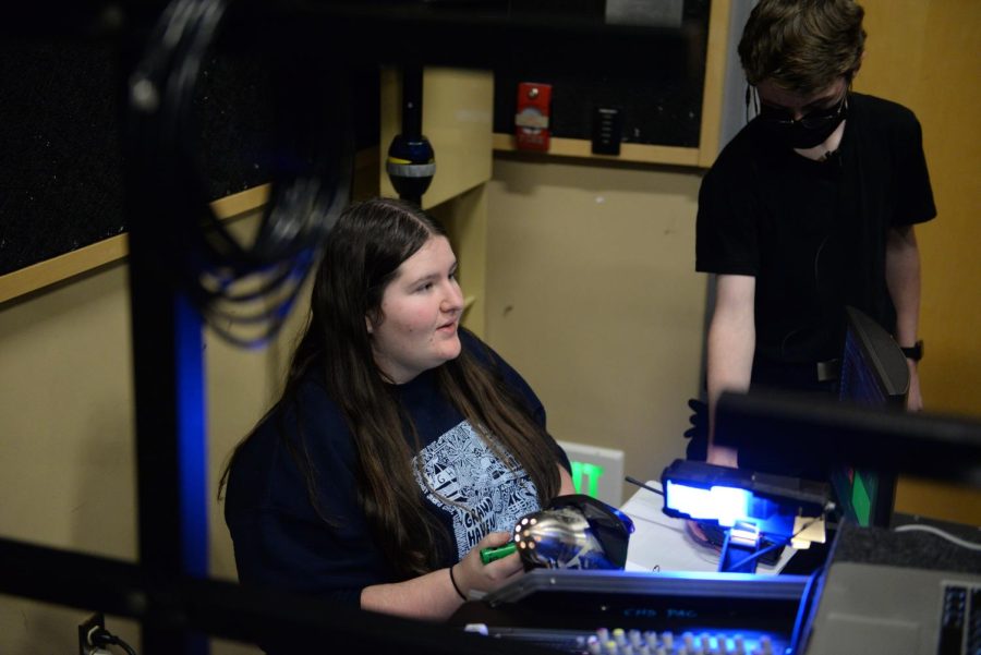Carlmont Technical Theater Association (CTTA) members Juliette Mansfield and Michael Connolly work in the Studio Theater Tech Booth.