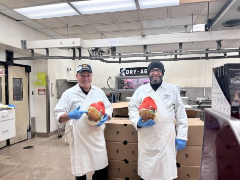 Piazzas butchers pose while unpacking a recent shipment of turkeys for Thanksgiving. Unlike many other stores nationwide, Piazzas luckily ensured enough stock for the holiday season. 