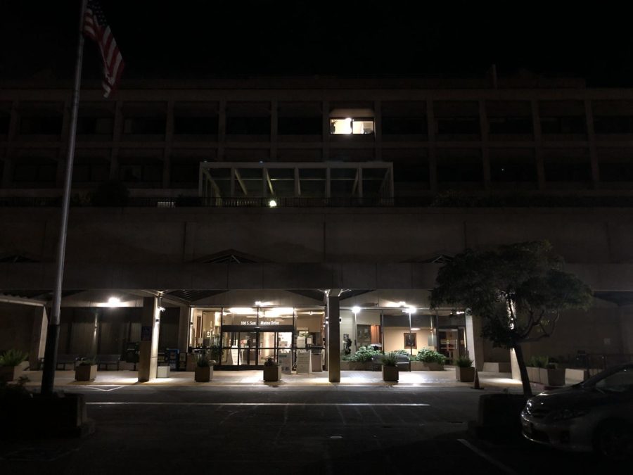 Outside view of Mills Health Center in San Mateo at night. Inside is a DaVita Dialysis clinic.