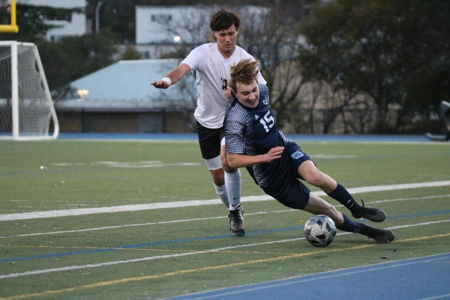 Senior left-back Hayes Gaboury fights to keep possession of the ball.