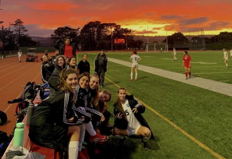 Last years varsity soccer team celebrates a win. The coaches hope to recreate this team camaraderie with their new squad during the upcoming season. 
