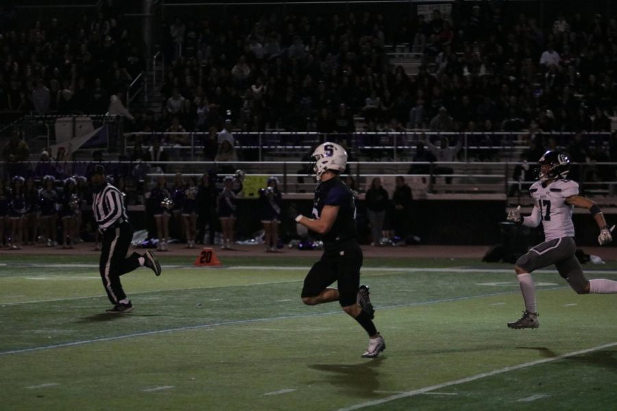 Sequoias player runs for a touchdown.
