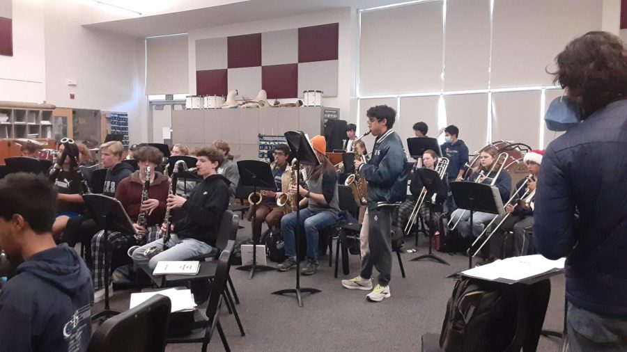 Symphonic Band practices in the band room for the flash mob. 