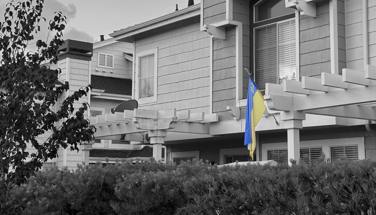 Bay Area residents hang up the Ukrainian flag outside their house to show their support for Ukraine.