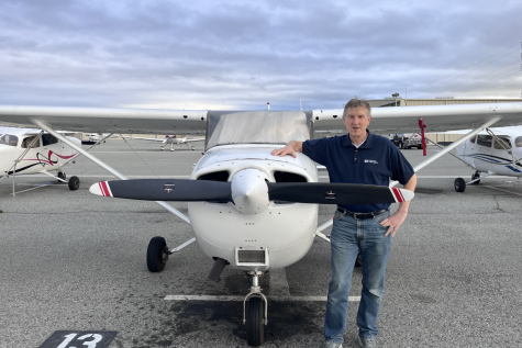 San Carlos Flight Center’s Chief Pilot Herb Patten is in front of a Cessna 172S, owned by the San Carlos Flight Center.
