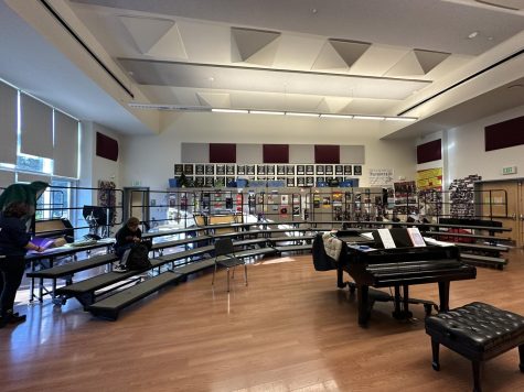 Students sit in Carlmont Choirs main practice room, which is located in F21.
