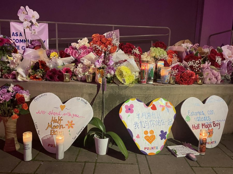People+leave+flowers+and+messages+grieving+the+loss+of+the+seven+people+who+died+in+the+Half+Moon+Bay+shooting.+Some+messages+were+written+in+Mandarin+and+Spanish%2C+reflecting+the+cultural+backgrounds+of+the+victims.+