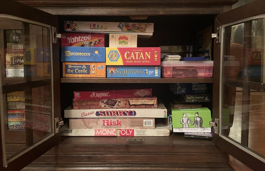 A cabinet full of board games