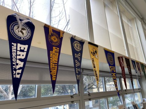 College pennants hang in the Carlmont College and Career Center.