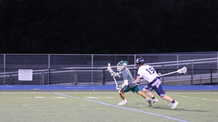 Junior Braedan Kumer chases a Vikings player after the Scots lose a possession. 