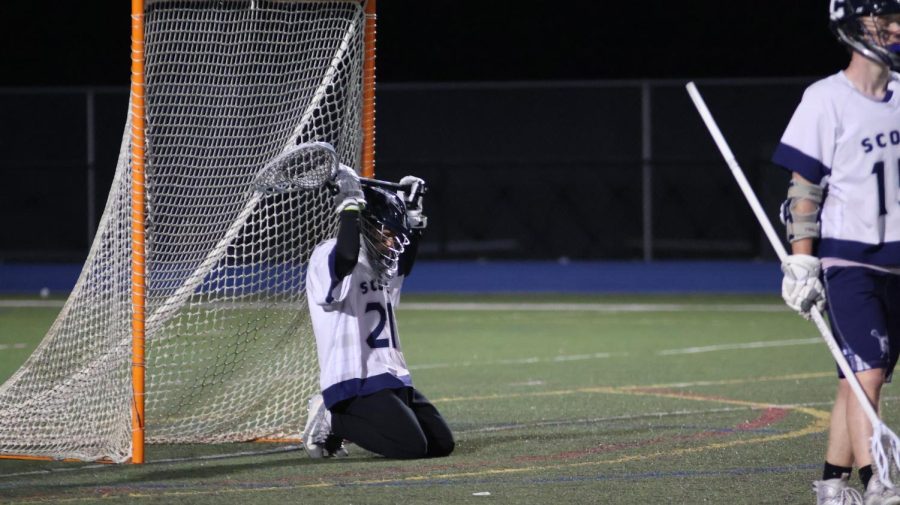 Goalie Callum Gray (21) is frustrated after allowing the Palo Alto Vikings to score a goal. 