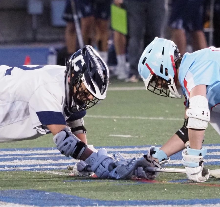 Lacrosse begins with a face off, much like in hockey.
