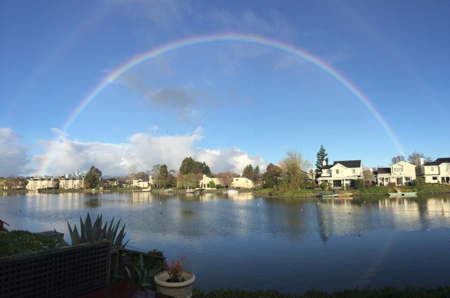 A rainbow forms over Redwood Shores.