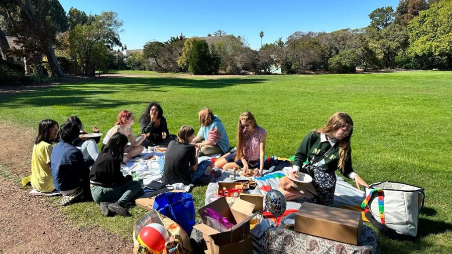 A group of friends having a picnic.