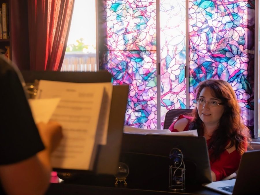 Gina Latimerlo gives feedback to her student vocalist during a lesson. 