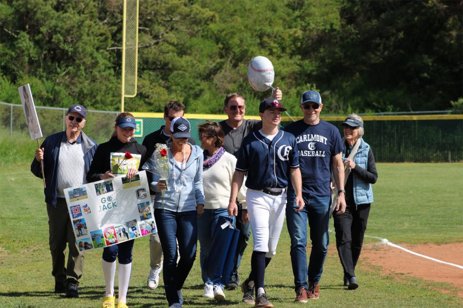 Infielder Jack Wiessinger walks with his family.