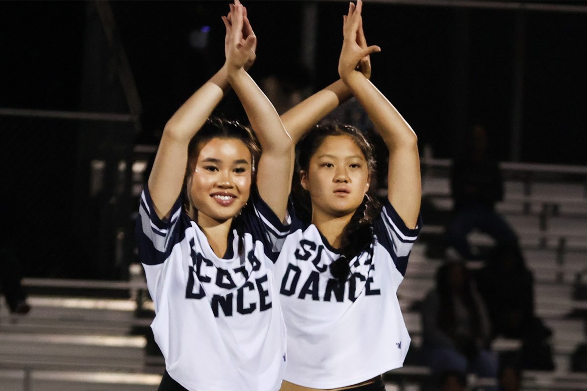 The Carlmont dance team performs after the Scots cheer during halftime. They welcomed many new and skilled freshmen to the team. They are excited to continue to perform for the rest of the season.  