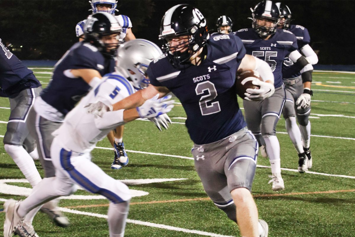 Senior running back Braedan Kumer gains yards for the Scots in the second quarter. This led to another touchdown for the Scots, exciting the crowd. Despite the Eagles catching up in the score, the Scots were eager to take the lead once more. 