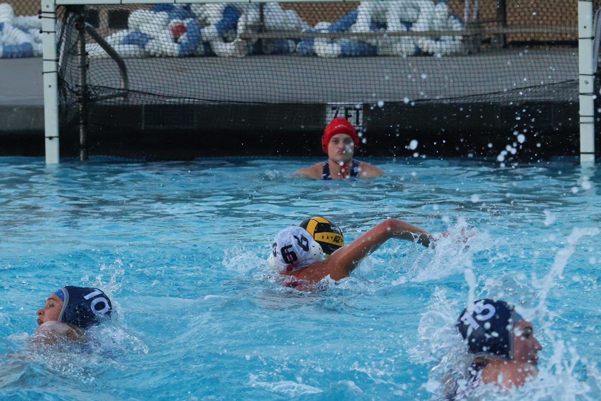 Juniors Mattie Llido and Jackson Sneeringer chase down an Aragon center, who has a clear path toward the goal. Due to a lack of players compared to Aragon, Carlmont’s players were tired toward the end of the game. Many of the Dons’ goals were fast-breaks because they were able to outswim the Scots. 