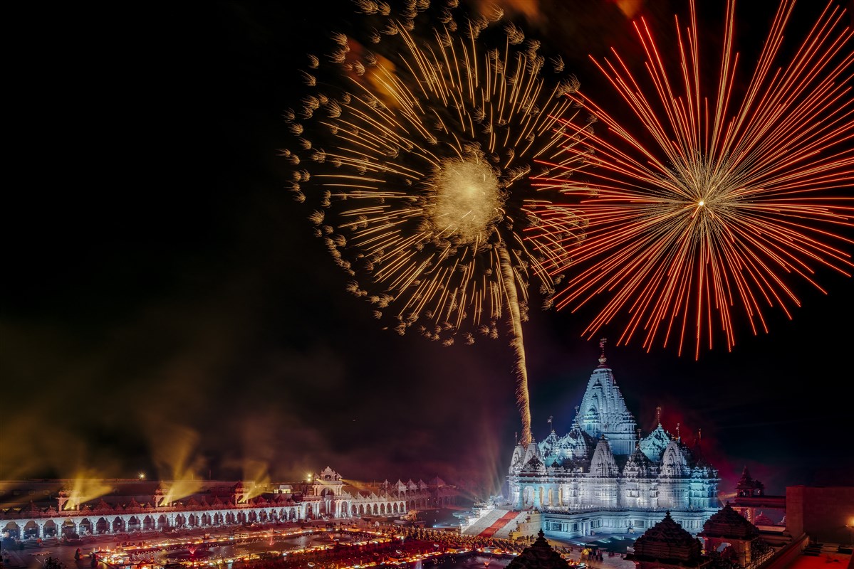 Celebratory fireworks go off overhead at the Inauguration of the BAPS Temple in New Jersey. 