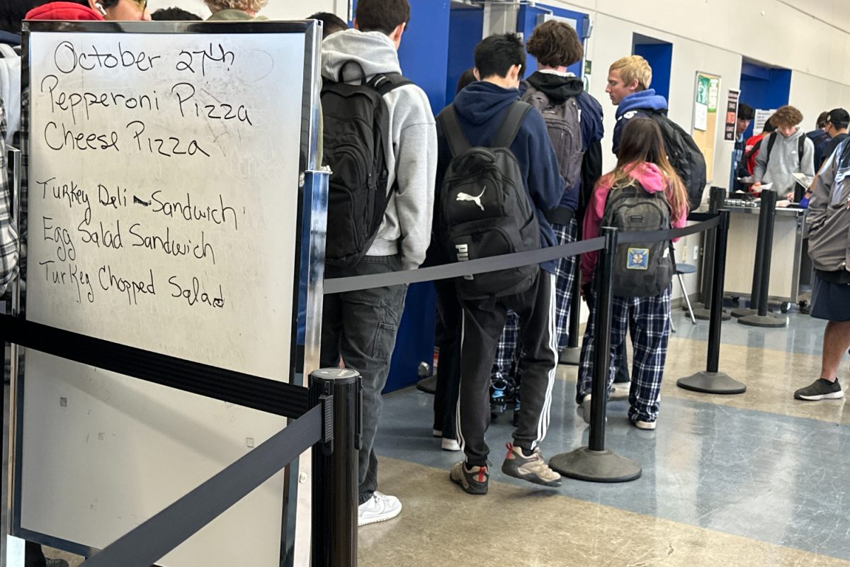 Students wait in the express line inside the student union. This line is known to move the quickest, as the check-out process is done at the end after the food is picked up. Fridays, known for the pizza, are usually the busiest days.