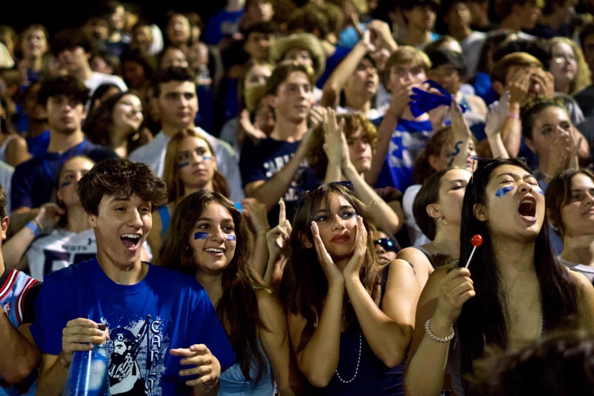 The student section watches in anticipation and excitement as the game unfolds, with students decked out in blue and Scots gear for the Bleed Blue theme. Their vibrant display of school pride made for an unforgettable experience.