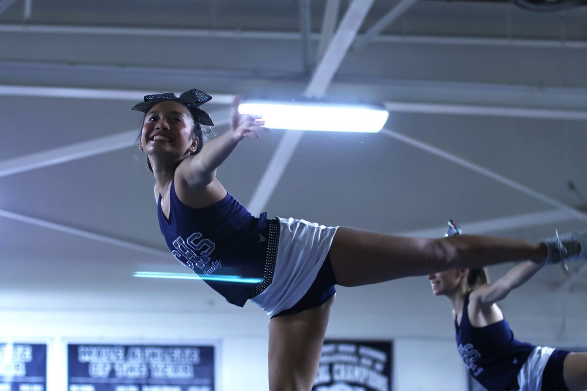Junior Makayla Miller highlighted the cheer teams top-tier energy as the group performed different moves and stunts. She struck a pose that wowed the audience with their skills and started the assembly strongly. 