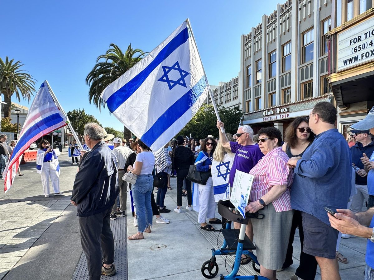 Locals gather in downtown Redwood City to rally in support of Israel.