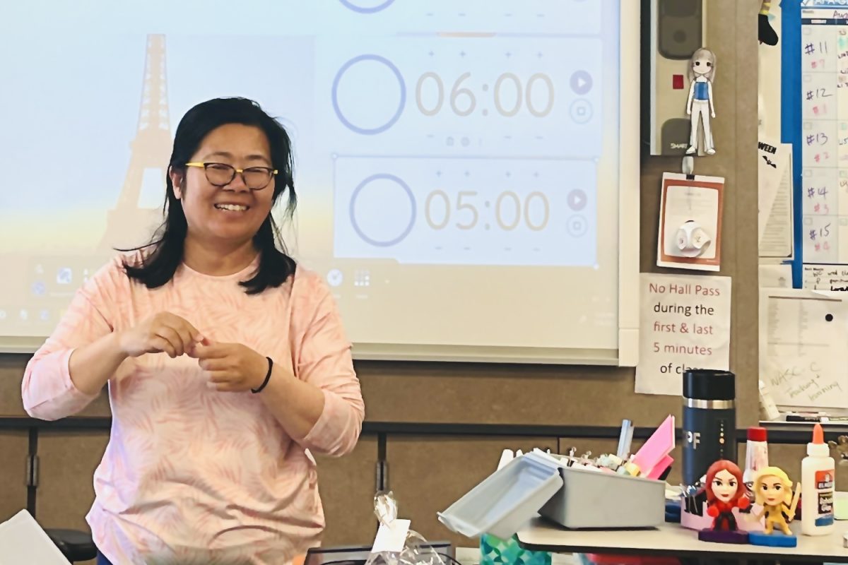 Mindy Chiang, director of the Carlmont Chinese program, prepares materials for an embroidery project. Any world language program can empower students because it exposes you to a different culture, Chiang said. 