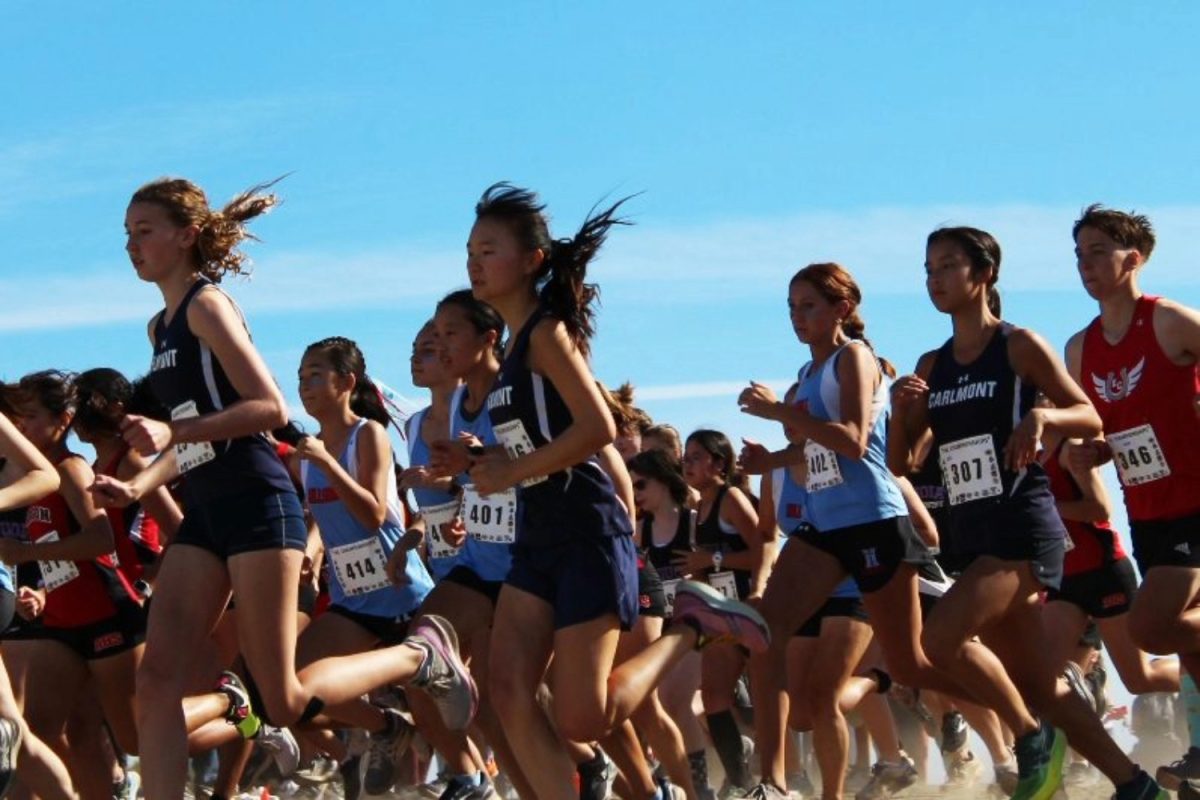 Carlmont runners Amanda Kerby, Umi Tomita, and Maya Tse run in the race amongst other students. Carlmont scored first place in the FS girls race against 16 other schools.
