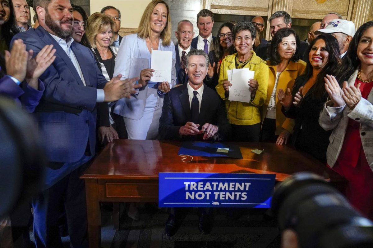California Gov. Gavin Newsom signs off on two proposals in Los Angeles, on Thurs., Oct. 12, 2023, to transform the state’s mental health system and address the state’s worsening homelessness crisis, putting them both before voters in 2024. 