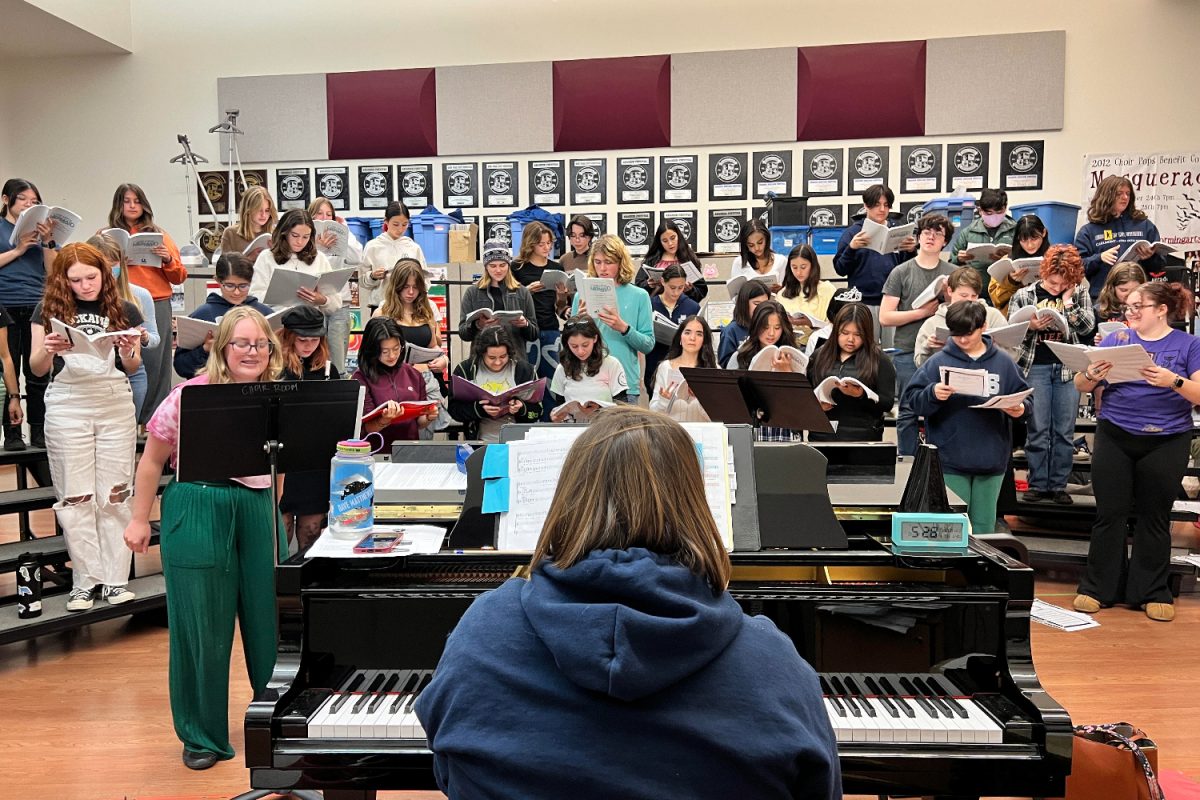 Tierra Linda Middle School Music Director and the vocal director, Tabitha Tetreault, plays the piano as students rehearse songs for the musical.