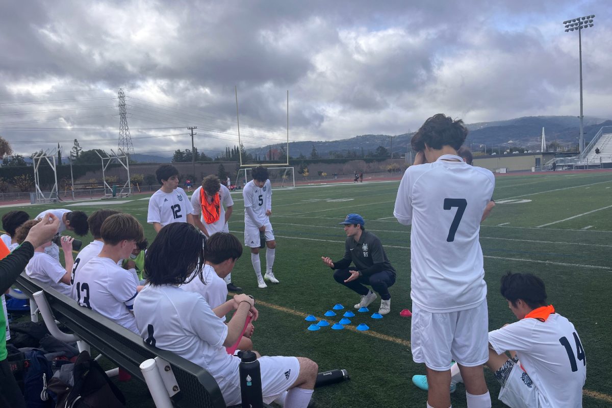 Head coach Ryan Freeman makes numerous halftime adjustments to prepare for the second half. Freeman talked to the team about where to pass the ball and the intensity that he wanted.