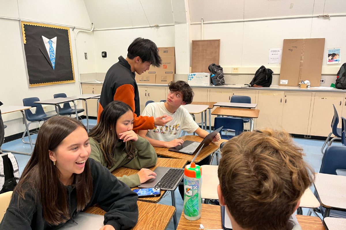 Carlmont DECA members hard at work polishing their submissions for their respective events during the last meeting before winter break.