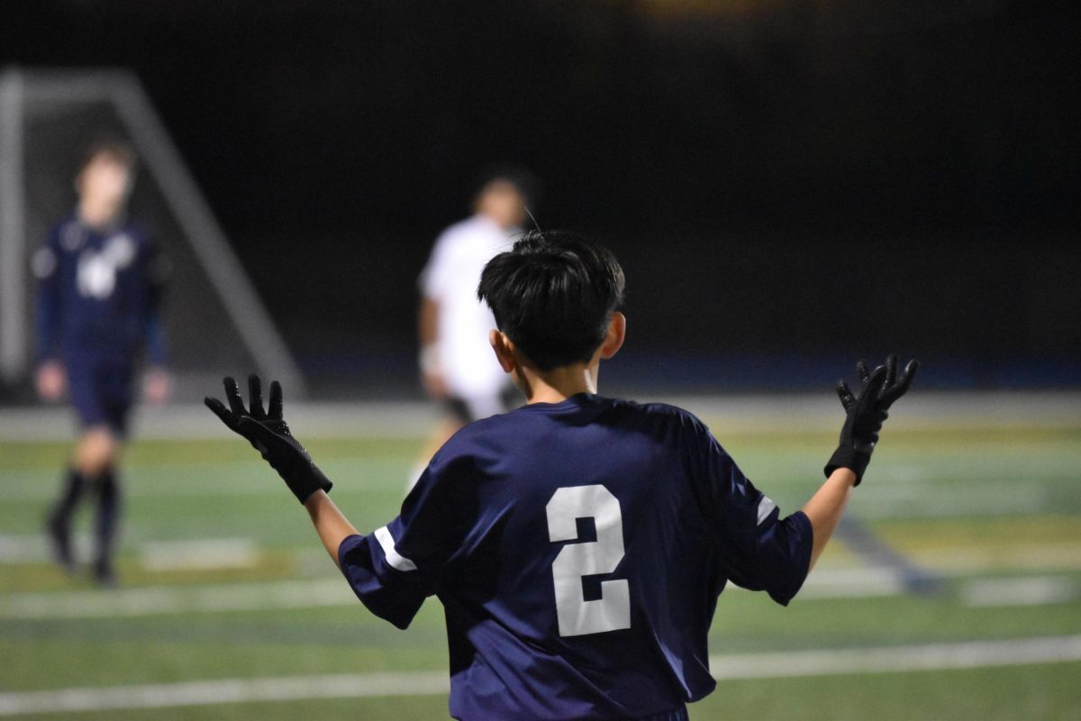 Noah Pang celebrates after the Scots successfully win.