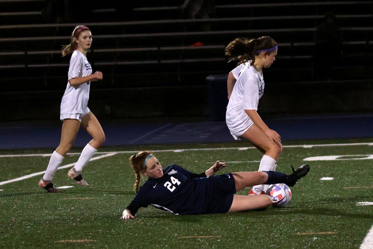 Scots midfielder Delaney Kumer attempts a slide tackle to gain back possession. After losing the ball, Kumer was determined to win it back before the Ravens could establish a counter-attack. Her slide tackle was unsuccessful, but it showed the sheer determination Kumer played with.