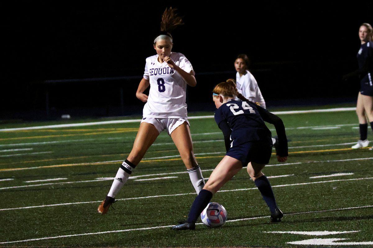 Freshman Delaney Kumer fakes out a Sequoia defender while making a run toward the goal. Because she executed her move well, Kumer separated herself from the defender. This gave her enough time to pass to a teammate.