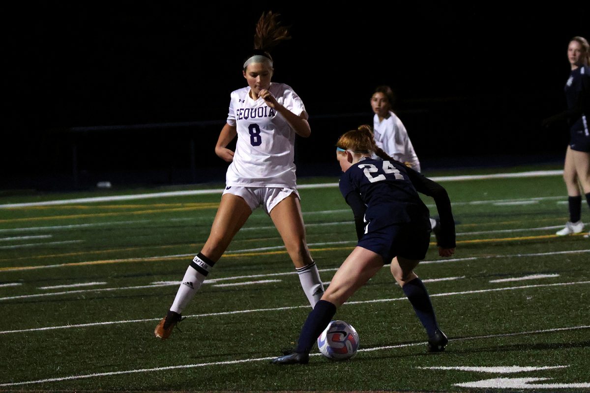 Freshman Delaney Kumer fakes out a Sequoia defender while making a run toward the goal. Because she executed her move well, Kumer separated herself from the defender. This gave her enough time to pass to a teammate.