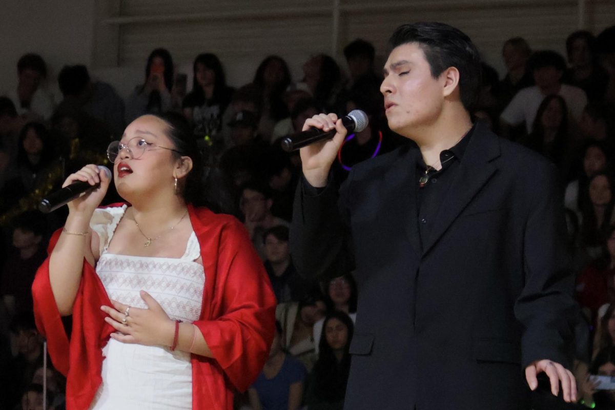 Representing the Latinos Unidos x Black Student Union Club, juniors Kimberly Garcia and Ricardo Duarte sing a duet of “La Llorona.” Surrounding the singers are dancers dressed in vibrant embroidered Jalisco dresses. These dresses are typically designed for Folklórico dance events like the one performed.