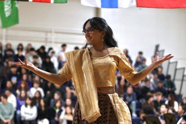 Junior Monika Mukerji and other members of the Indian Club stage choreography for a popular Bollywood song named What Jhumka? The performers wore colorful and intricate traditional Indian dresses that added to the expressional mood. The use of emotion, movement, and hand gestures made this performance energetic and happy.