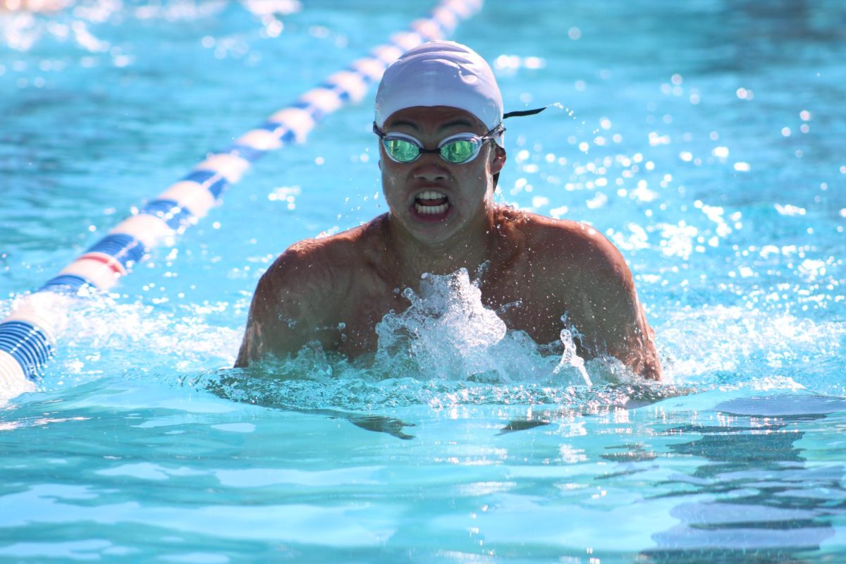 Junior+Zerach+Chan+swims+breaststroke+for+the+200-yard+medley+relay.+Chan+completed+his+50+yards+in+27.9+seconds.