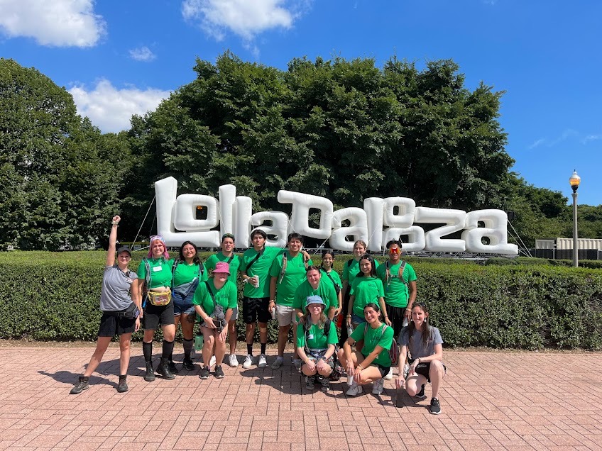 REVERB, Chicago/Lollapalooza, August 2023                                                      The REVERB team stands behind the Lollapalooza sign outside the concert venue in Chicago. In 2023, the team partnered with Billie Eilish and many other musicians. “We partnered with a company called Overdrive Energy Solutions to power Billie’s set with solar power rather than diesel generators,” Roth said. “This was a success because a major artist and a major festival showed trust in REVERB to make this project possible and show other artists and festivals what is possible!” 
