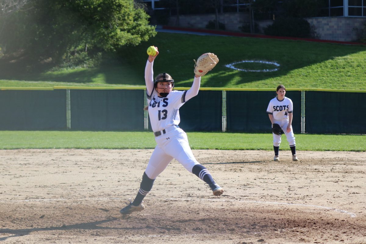 Scots freshman Abby Maher pitches the ball. Maher pitched for the whole match and helped the Scots secure multiple outs. The Scots executed well defensively, conceding no runs.