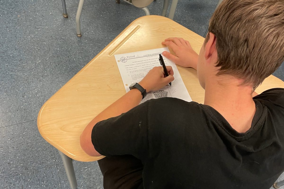 Carlmont student Maksim Lukoianov takes a Spanish test the week prior to spring break. According to Lukoianov, he had a Spanish test and a math test in the same day, which stressed him out.