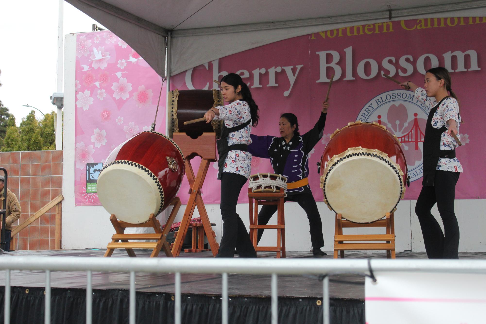 Two students of taiko drumming perform at the Cherry Blossom Festival. Taiko, literally meaning drum, is a hallmark of Japanese traditional instruments and, according to the Taiko Center, and has been around for over 2,000 years.