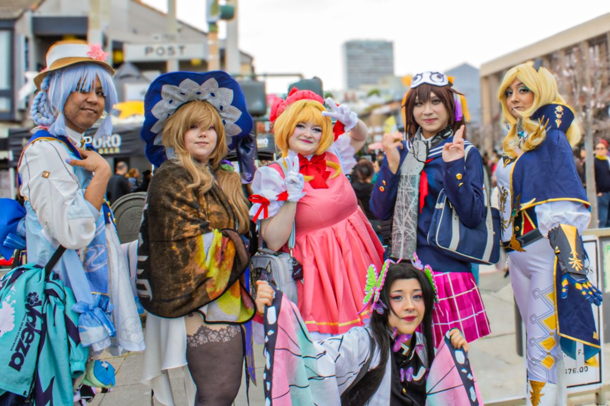 A group of festival attendees dressed in cosplay of popular Japanese characters to attend the Cherry Blossom festival. Cosplay is popular among fans of Japanese anime and other Asian media.