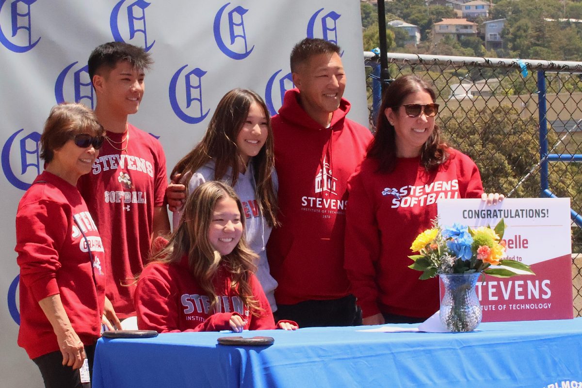 Isabelle Won poses with her family for a photo. Won will be attending the Stevens Institute of Technology to play softball. This year, Won got nominated for the Player of the Year and First Team Peninsula Athletic League (PAL) All-League awards.