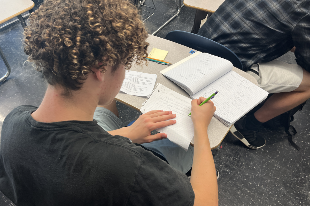 Carlmont student Nathaniel Dempsey working on an extra credit opportunity in class right before it is due.
“I had forgotten about this extra credit opportunity to write a speech for Memorial Day. It just slipped my mind because Ive practically finished history,” Dempsey said.
