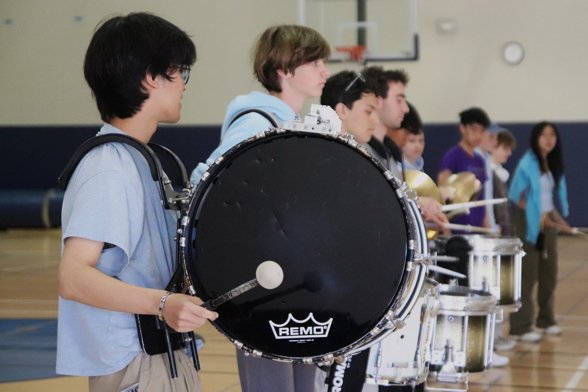 After running through the steps without their drums, Drumline starts going through the motions with their instruments. They play a simple beat, allowing them to focus more on the steps. May 29 was Drumline’s last practice, but they all are excited for the future. 